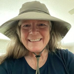 NWOT Sun Protection Zone adjustable olive unisex hat. Folds in half for packing.